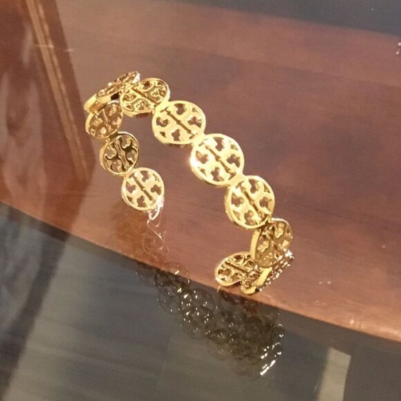 TORY BURCH CIRCLE LOGO CUFF 18 K GOLD BRACELET - Picture 1 of 8